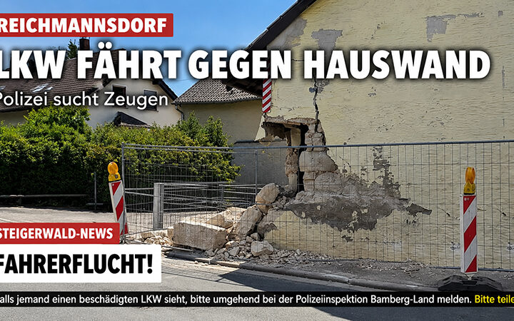 kaputte Hauswand bzw. Mauer in Reichmannsdorf an der Hauptstraße. Risse sind zu sehen. Die Unfallstelle ist abgesperrt. Vermutlich LKW beteiligt in Reichmannsdorf, Ortsteil von Schlüsselfeld